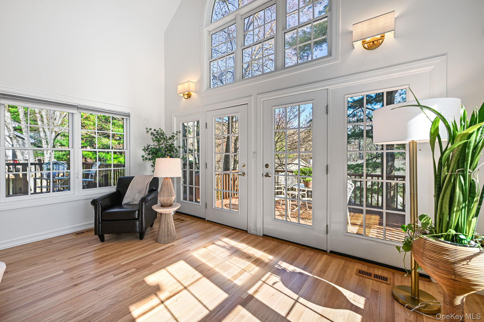 125 Cross River Road Mount Kisco, NY 10549 - Photo 10 of 46 Wall of windows and doors to deck