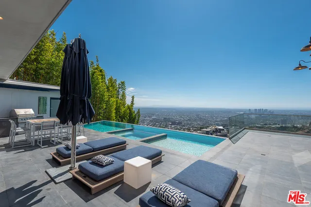 a view of a building with a yard