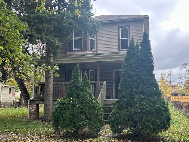 10230 South Union Avenue Chicago, IL 60628 - Photo 1 of 28 front view of a house with a tree