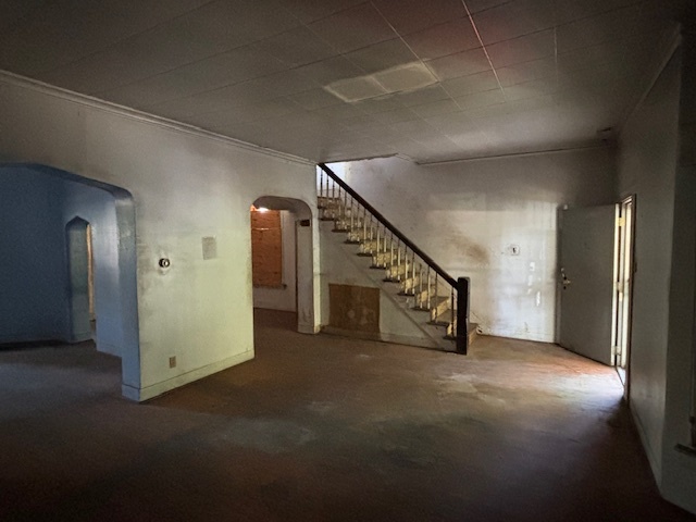 10230 South Union Avenue Chicago, IL 60628 - Photo 16 of 28 a view of an empty room with stairs