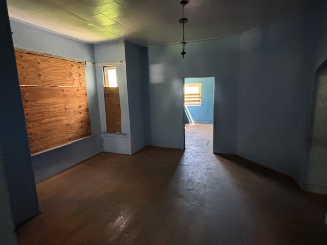 10230 South Union Avenue Chicago, IL 60628 - Photo 18 of 28 a view of a livingroom with an empty space and a window