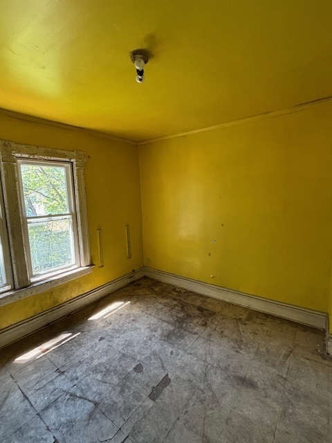 10230 South Union Avenue Chicago, IL 60628 - Photo 25 of 28 a view of a room with window