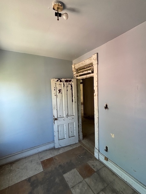 10230 South Union Avenue Chicago, IL 60628 - Photo 27 of 28 an empty room with windows