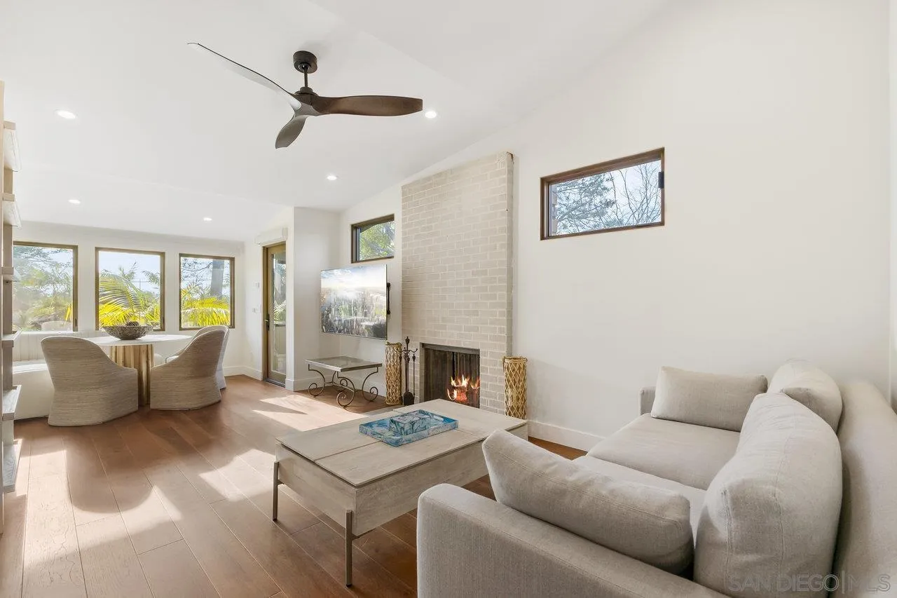 1373 Crest Road Del Mar, CA 92014 - Photo 46 of 55 a living room with furniture and a fireplace