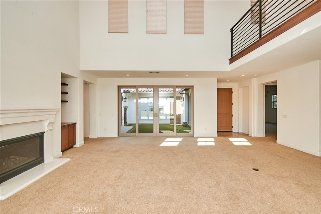 245 Snapdragon Lane Glendora, CA 91741 - Photo 17 of 42 a view of an empty room with a fireplace