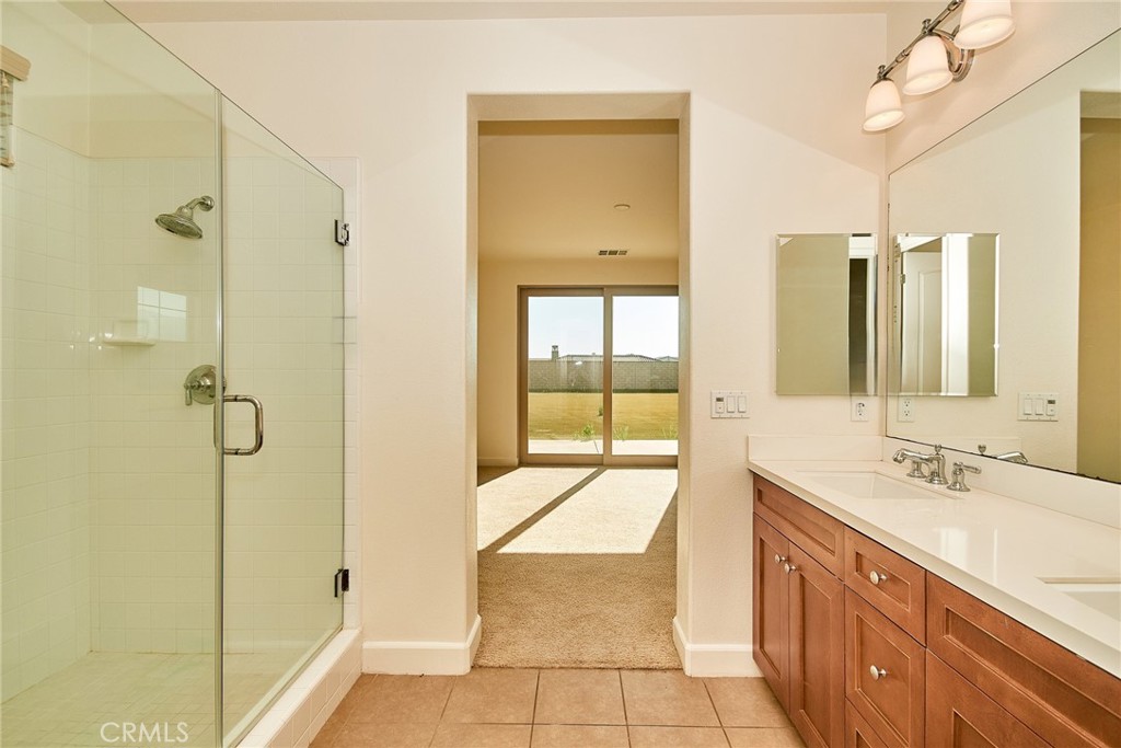 245 Snapdragon Lane Glendora, CA 91741 - Photo 31 of 42 a spacious bathroom with a tub shower and sink
