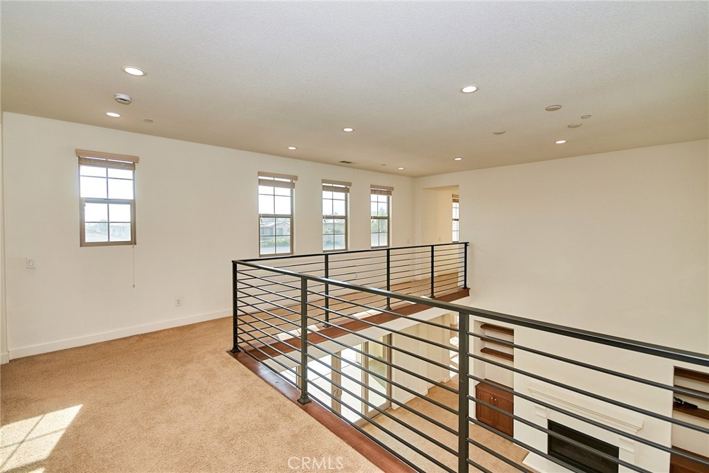 245 Snapdragon Lane Glendora, CA 91741 - Photo 32 of 42 a view of staircase with lots of wooden floor and windows
