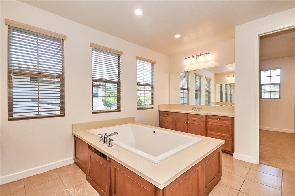 245 Snapdragon Lane Glendora, CA 91741 - Photo 33 of 42 a large white kitchen with a large window