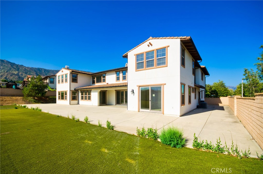 245 Snapdragon Lane Glendora, CA 91741 - Photo 6 of 42 a front view of a house with a yard