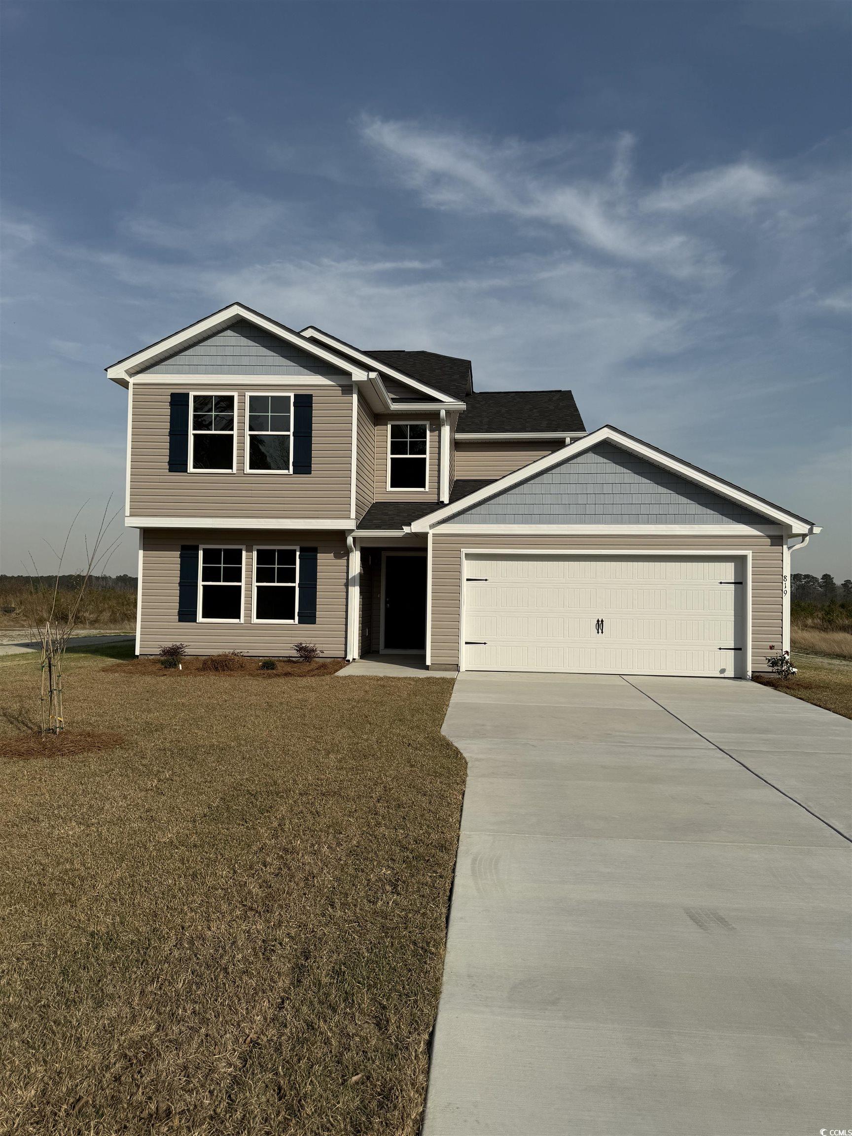 819 Busy Corner Road Conway, SC 29527 - Photo 3 of 24 View of front of house with a front yard, a garage