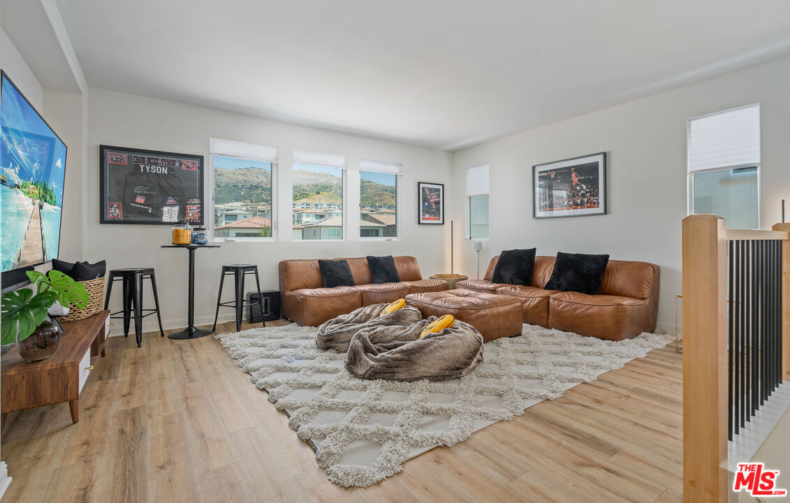 20763 Pine Cone Circle Porter Ranch, CA 91326 - Photo 7 of 20 a bed room with a bed and a couch