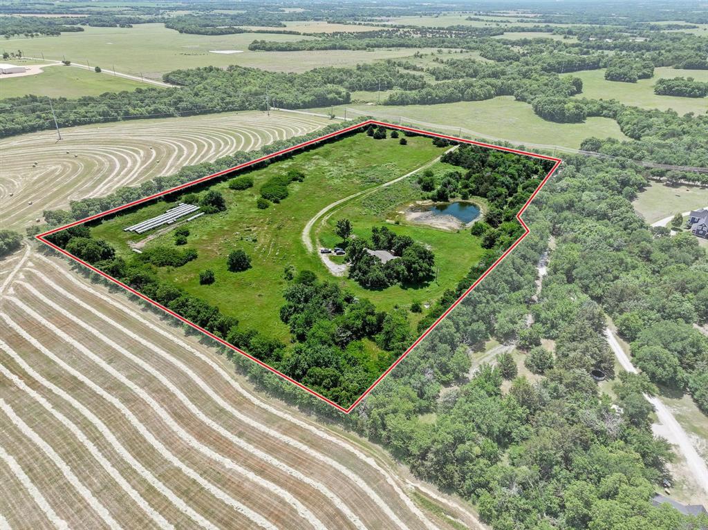 747 Vineyard Road Gunter, TX 75058 - Photo 15 of 32 a view of a yard with an outdoor seating