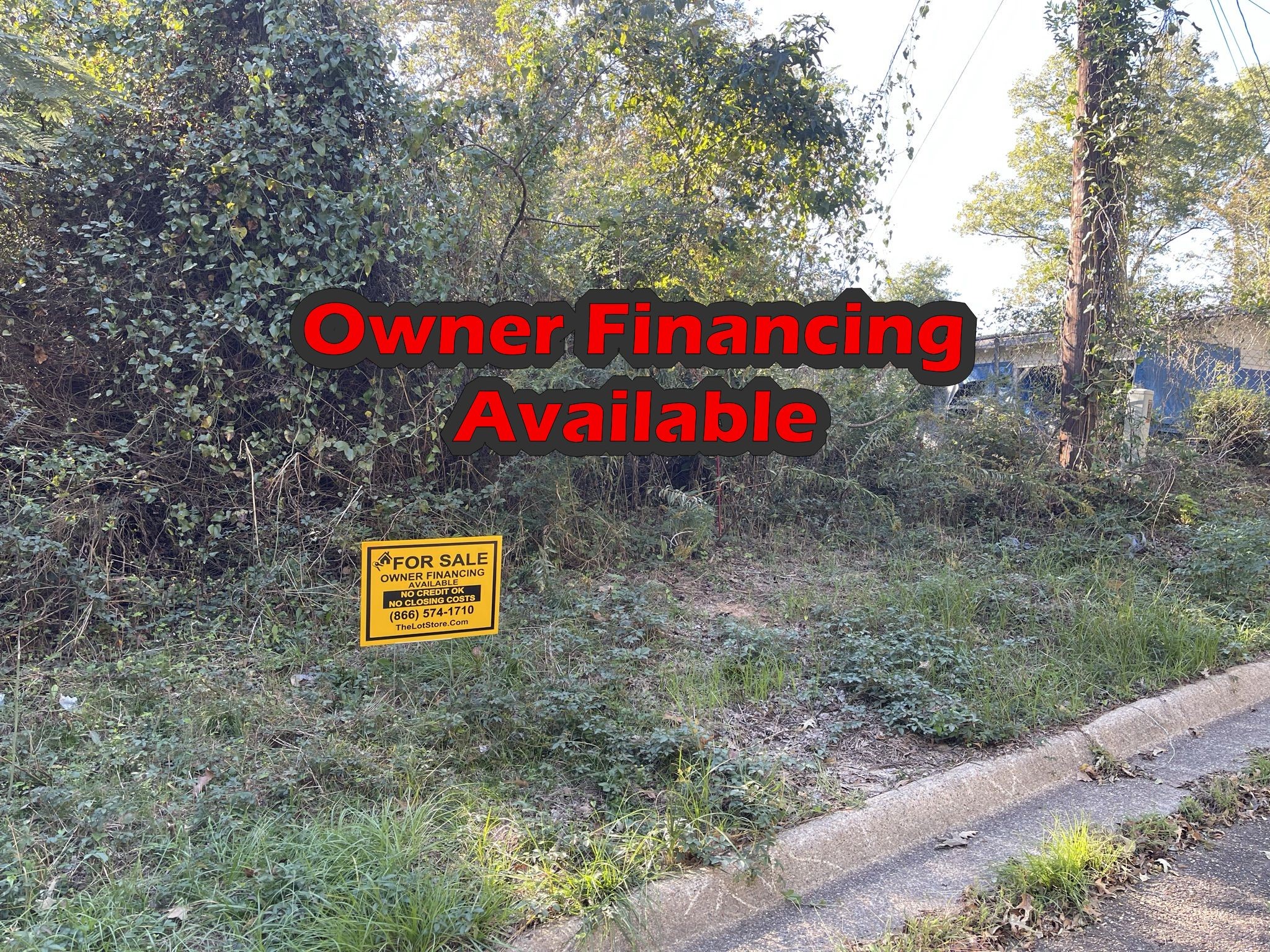 526 Spring Avenue Northwest Other, AR 71701 - Photo 6 of 6 a street sign that is sitting on a road