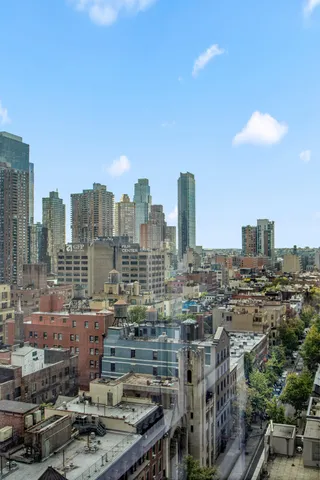 a kitchen with stainless steel appliances a sink stove and refrigerator
