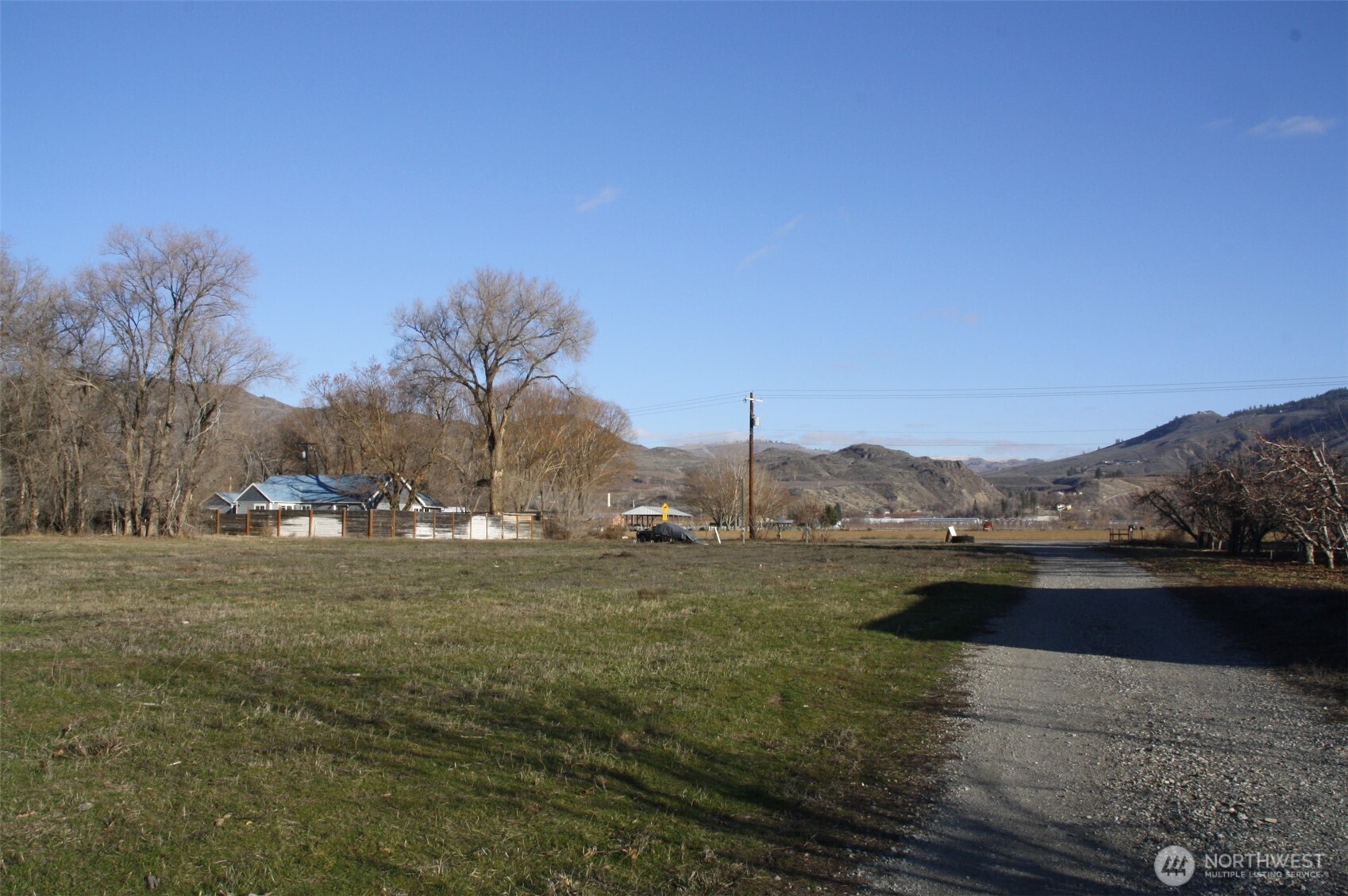 85 Chesaw Road, Unit B Oroville, WA 98844 - Photo 4 of 19 a view of lake with mountain