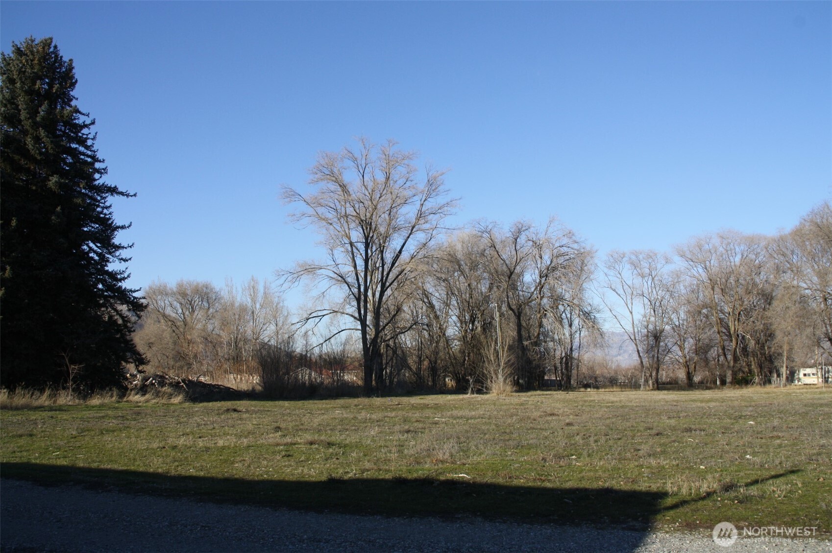 85 Chesaw Road, Unit B Oroville, WA 98844 - Photo 6 of 19 a view of an outdoor space and yard