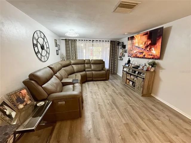 a view of a lake with a yard