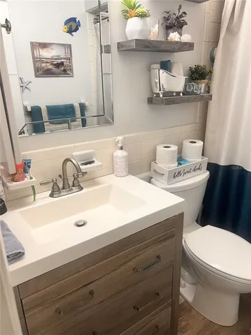 a bedroom with bed and window