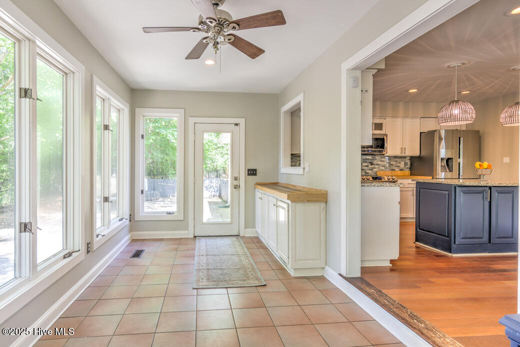 2428 Tram Road New Bern, NC 28562 - Photo 19 of 57 Large Sunroom off of the Kitchen