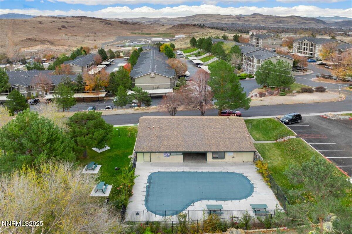 3941 Clear Acre Lane, Unit 237 Reno, NV 89512 - Photo 24 of 26 an aerial view of residential houses with outdoor space and swimming pool