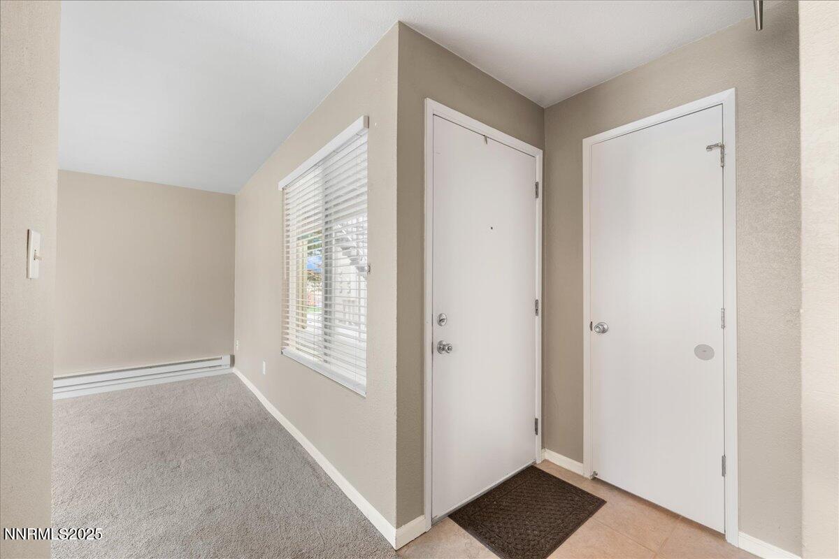 3941 Clear Acre Lane, Unit 237 Reno, NV 89512 - Photo 4 of 26 a view of hallway with window