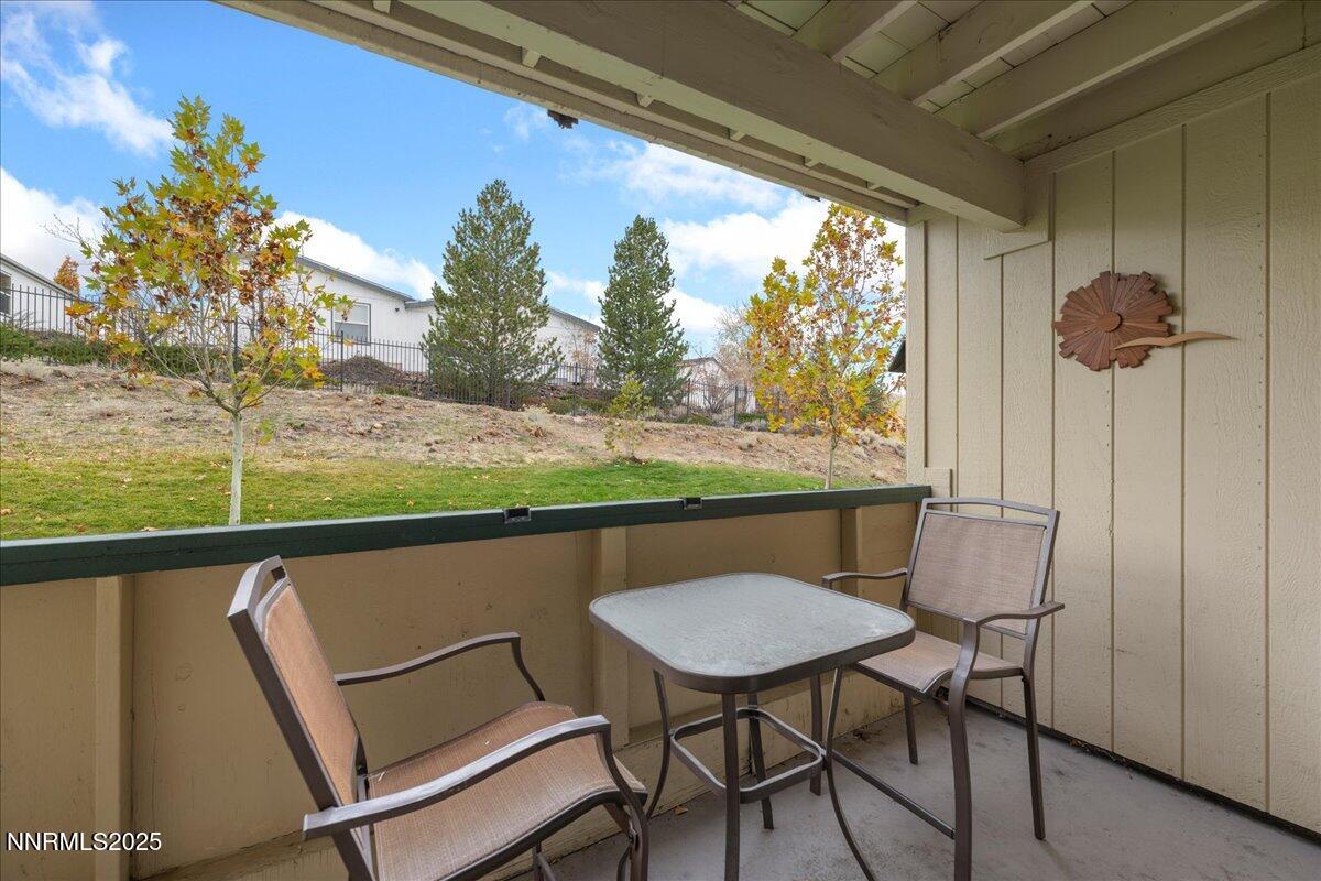 3941 Clear Acre Lane, Unit 237 Reno, NV 89512 - Photo 7 of 26 a view of a chairs and table in patio