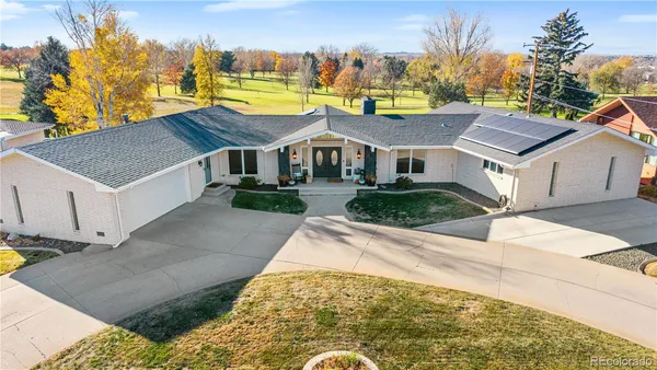 a view of house with yard