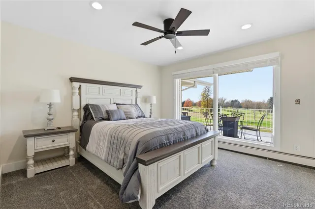 a living room with fireplace furniture and a table