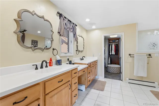 a view of a kitchen with a table and chairs