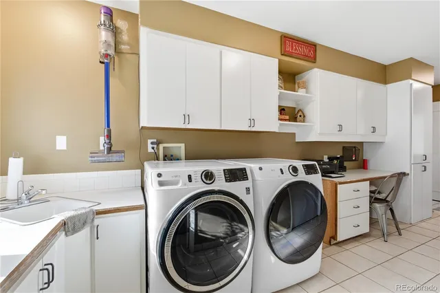 an aerial view of a house with a ocean view