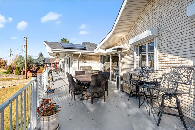 an aerial view of a house with a ocean view