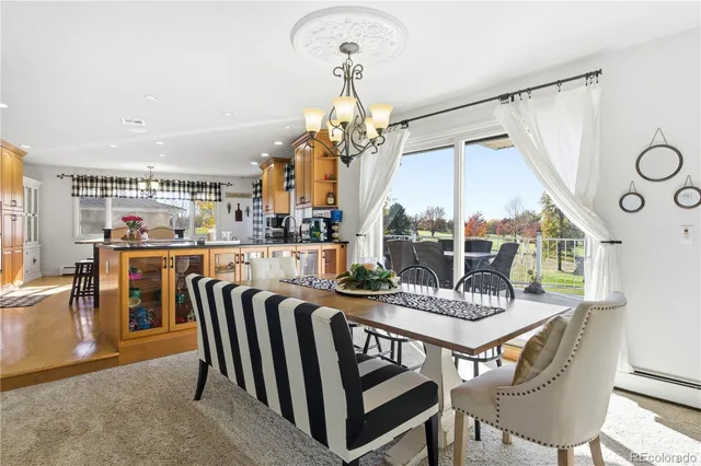 a bed room with a bed and a ceiling fan