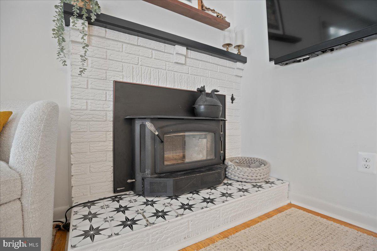 214 Dale Road Pasadena, MD 21122 - Photo 8 of 51 Fireplace with insert. Modern title