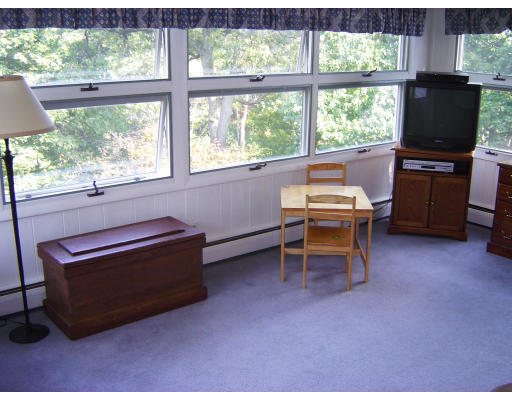 45 Tudor Road Needham, MA 02492 - Photo 4 of 9 a reading room with furniture and a window