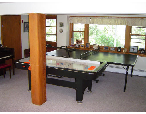 45 Tudor Road Needham, MA 02492 - Photo 6 of 9 a room with pool table and windows