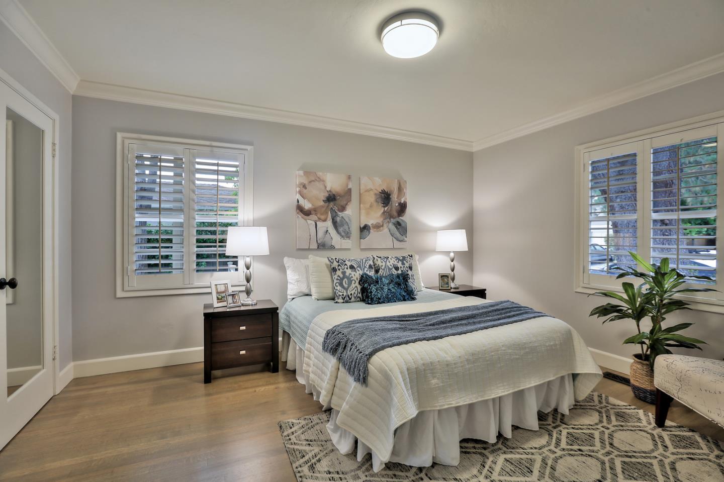 525 Alhambra Road San Mateo, CA 94402 - Photo 12 of 39 a bedroom with a bed flowerpot and window