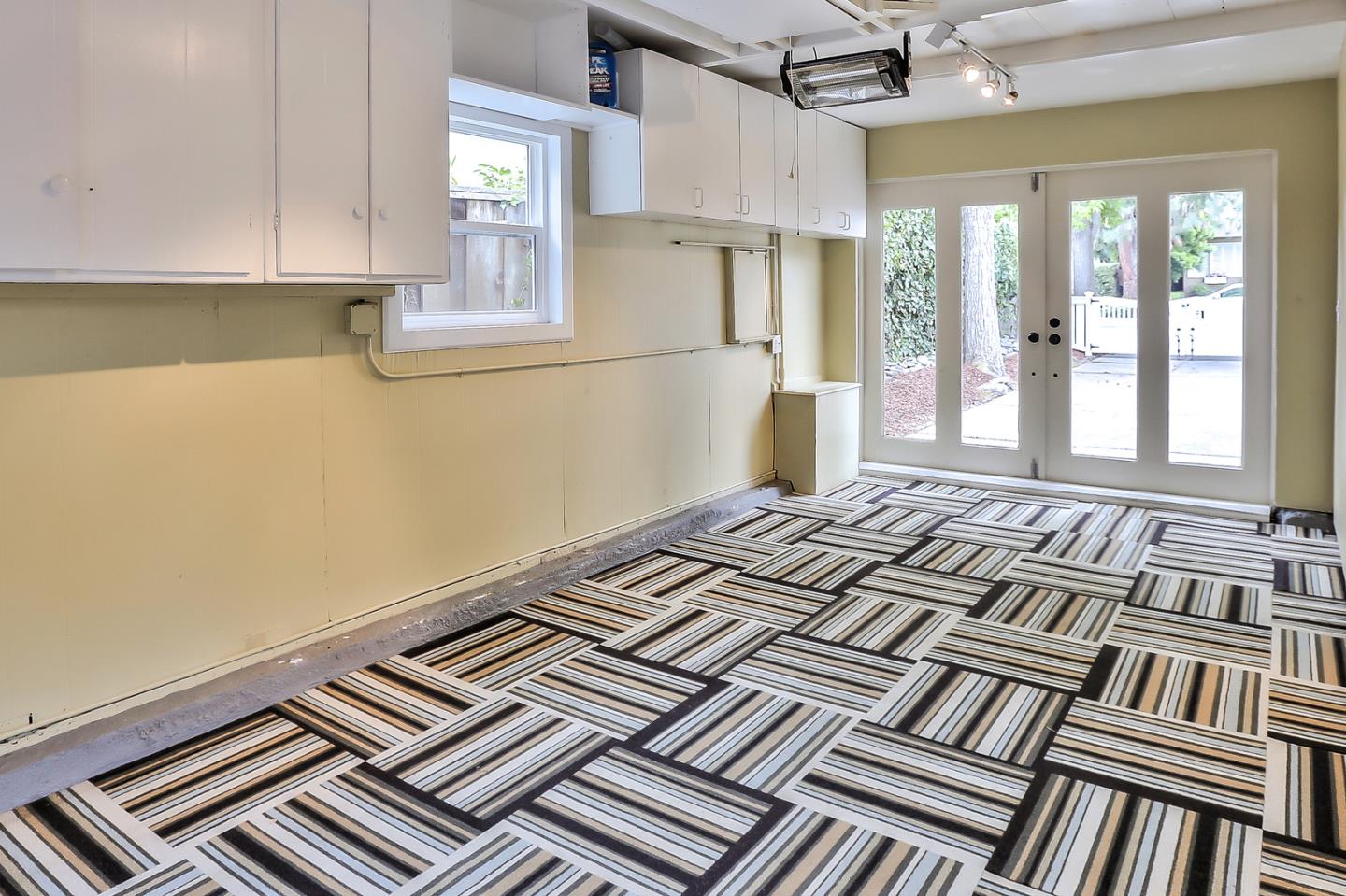 525 Alhambra Road San Mateo, CA 94402 - Photo 18 of 39 a bedroom with a bed and a window