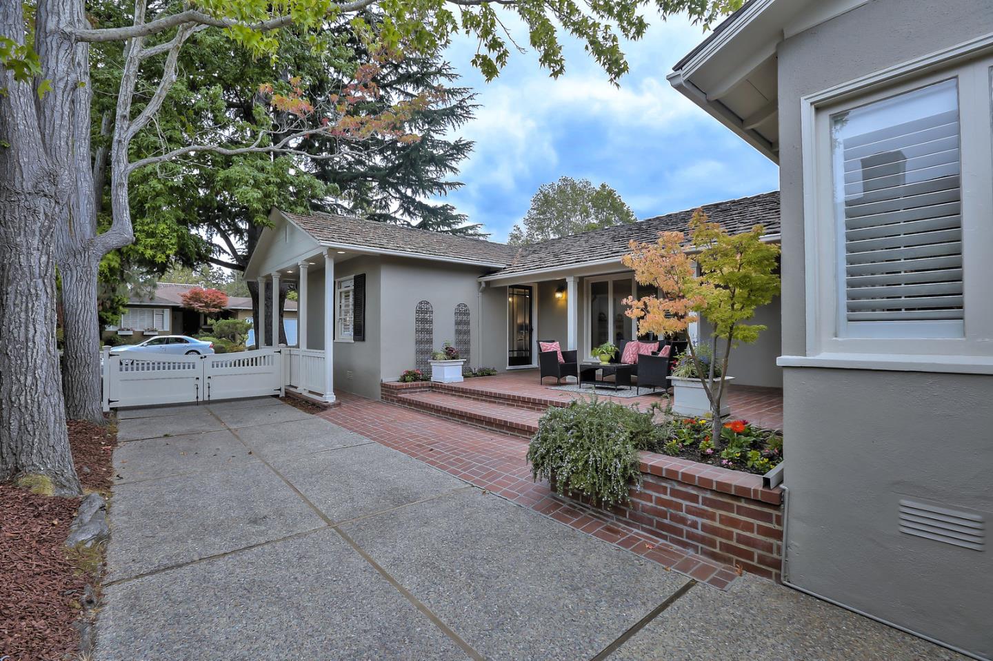 525 Alhambra Road San Mateo, CA 94402 - Photo 21 of 39 a view of a house with backyard porch and garden