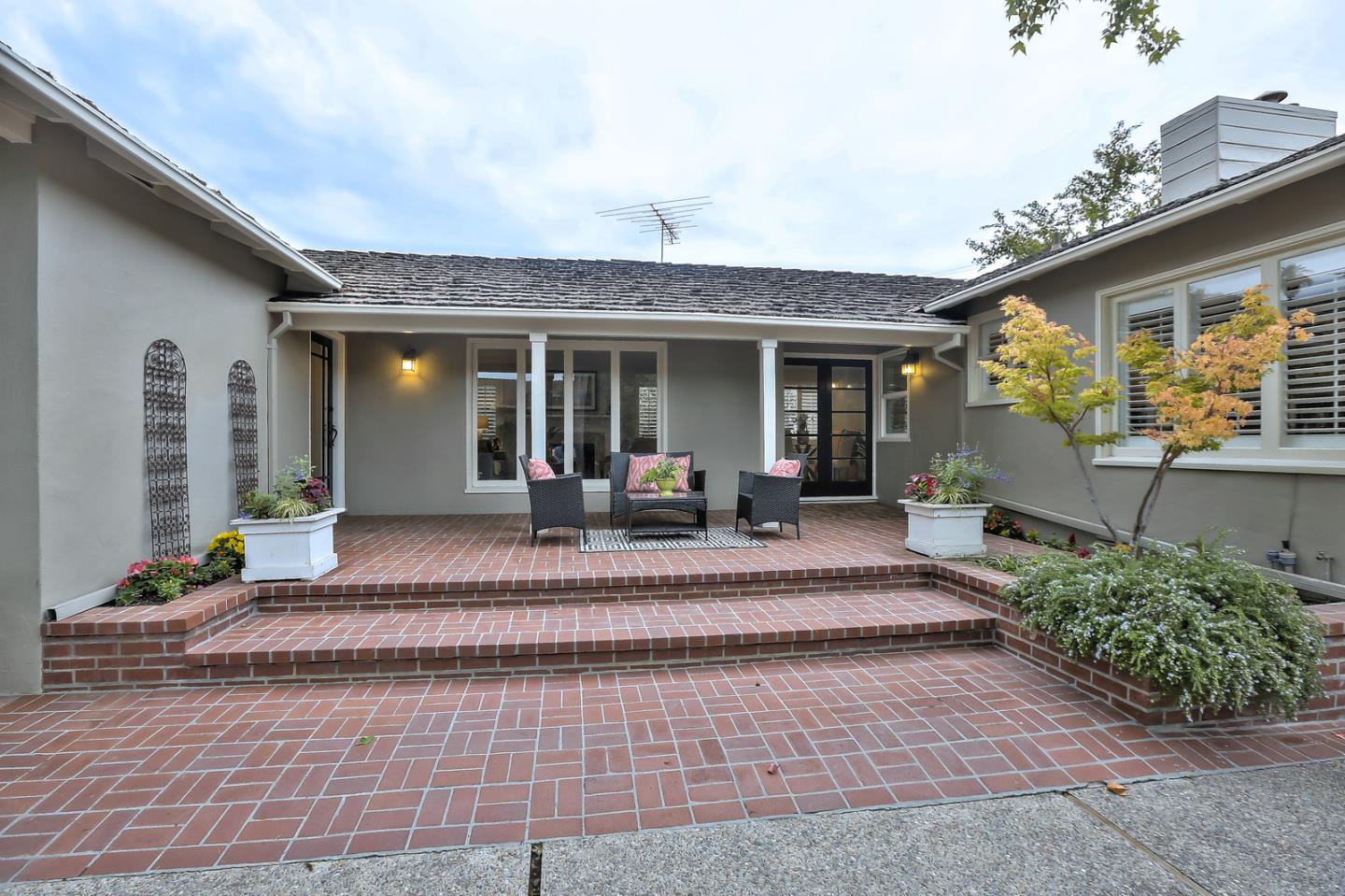 525 Alhambra Road San Mateo, CA 94402 - Photo 23 of 39 a view of a house with a patio