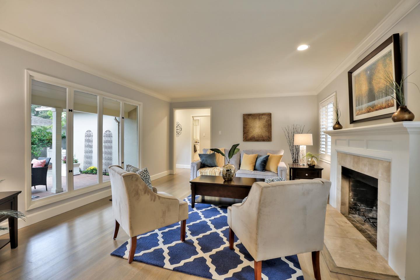 525 Alhambra Road San Mateo, CA 94402 - Photo 25 of 39 a living room with furniture fireplace and window