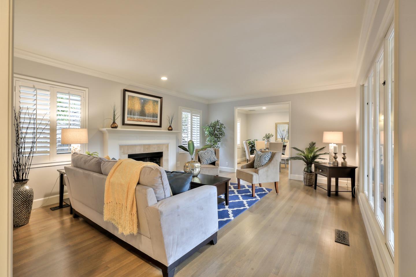 525 Alhambra Road San Mateo, CA 94402 - Photo 26 of 39 a living room with furniture and a fireplace