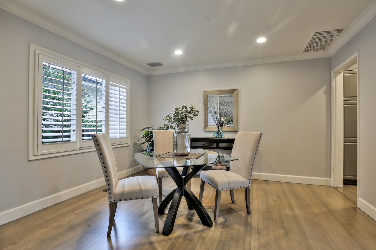 525 Alhambra Road San Mateo, CA 94402 - Photo 27 of 39 a view of a dining room with furniture and wooden floor