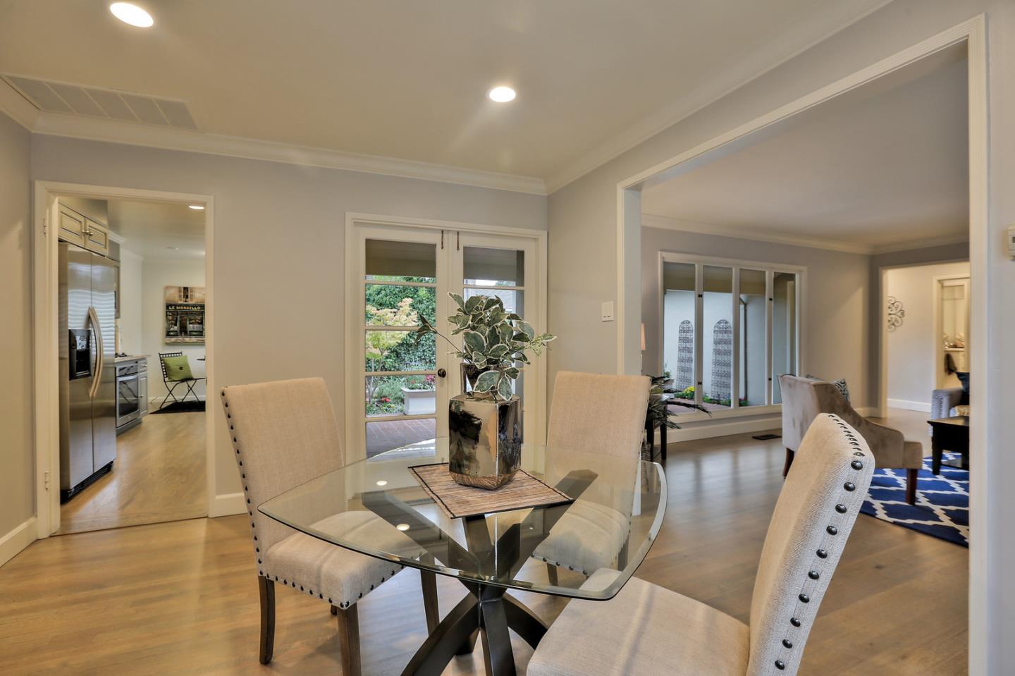 525 Alhambra Road San Mateo, CA 94402 - Photo 28 of 39 a living room with furniture and wooden floor