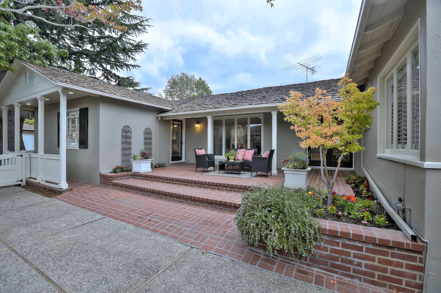 525 Alhambra Road San Mateo, CA 94402 - Photo 3 of 39 a view of a house with sitting area and garden