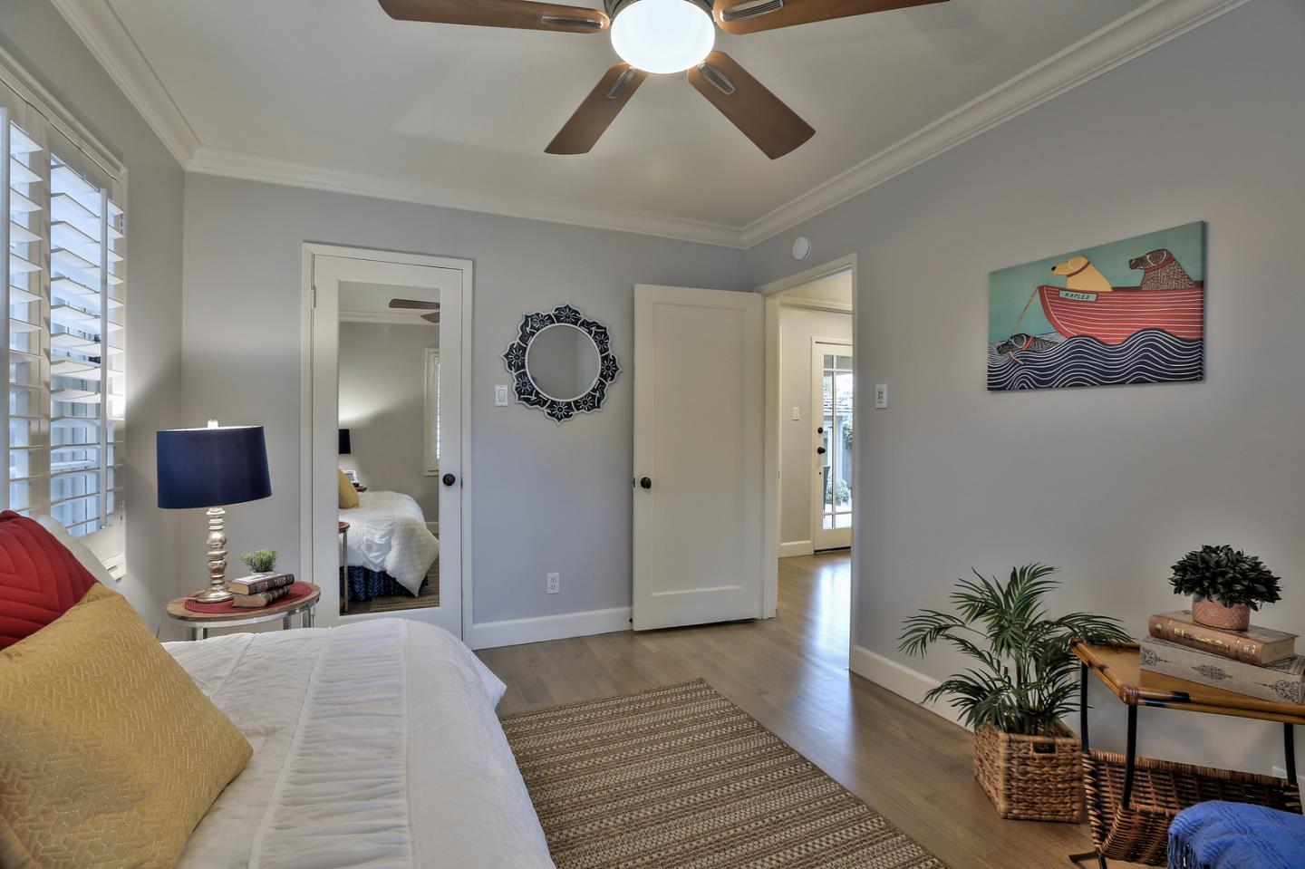 525 Alhambra Road San Mateo, CA 94402 - Photo 33 of 39 a living room with furniture and a chandelier