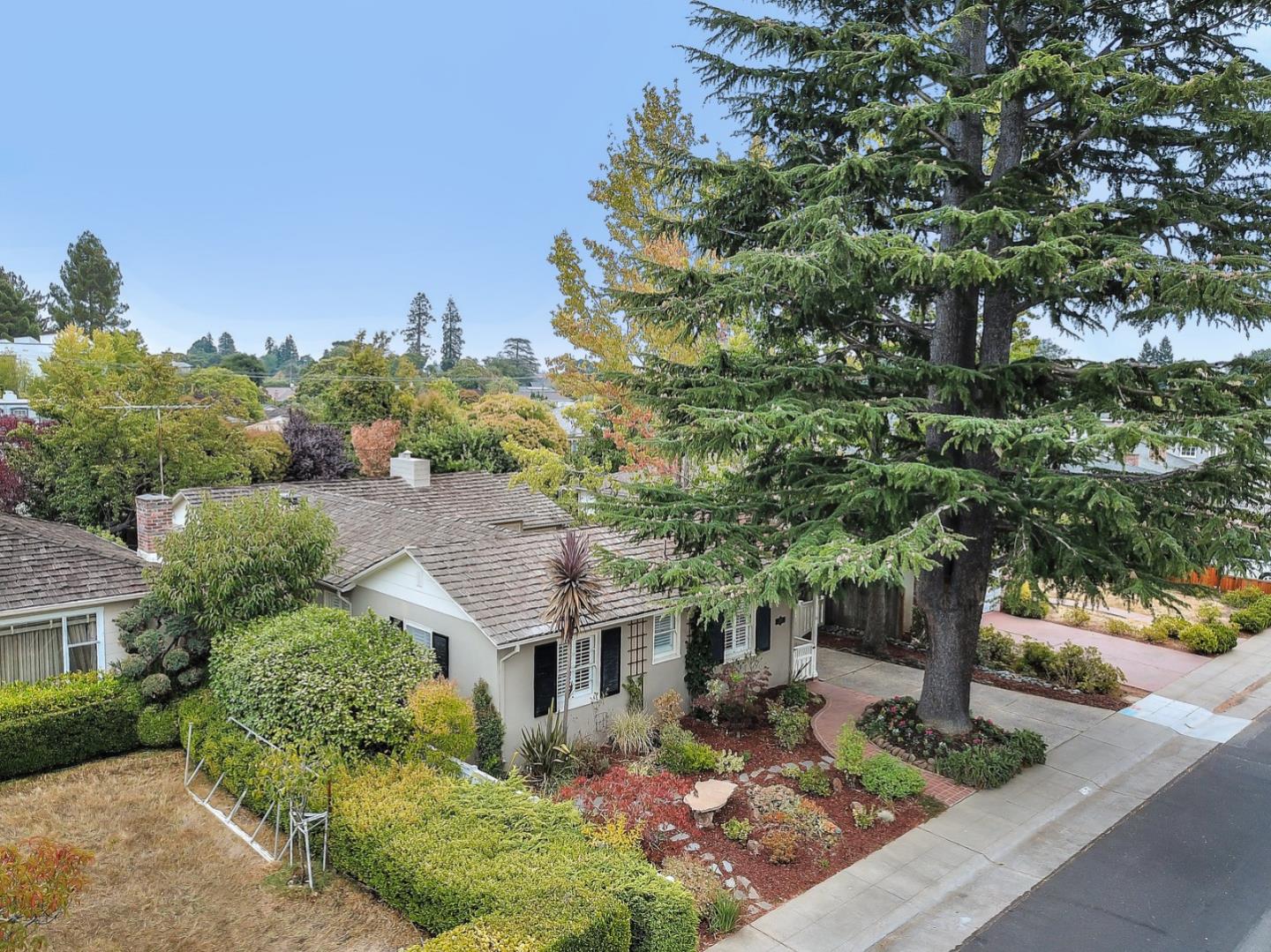 525 Alhambra Road San Mateo, CA 94402 - Photo 38 of 39 a front view of a house with garden