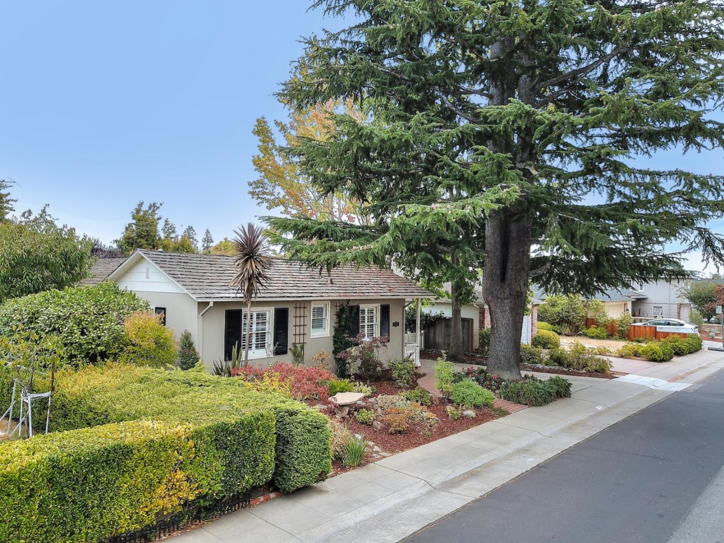 525 Alhambra Road San Mateo, CA 94402 - Photo 39 of 39 a front view of a house with garden