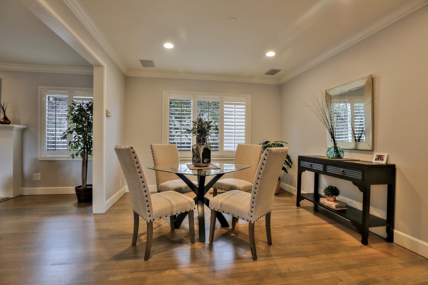 525 Alhambra Road San Mateo, CA 94402 - Photo 7 of 39 a view of a dining room with furniture and wooden floor