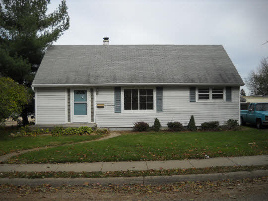 547 South 2nd Street Rochelle, IL 61068 - Photo 1 of 1 a front view of a house with a yard