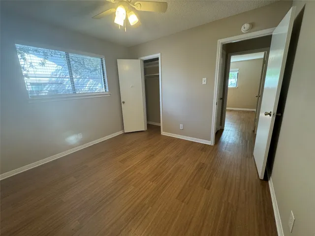 a view of a backyard of the house